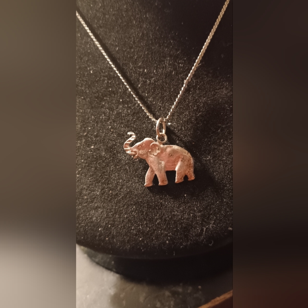 Sterling Silver Elephant with his trumpet up high sounding out 18 inch Necklace